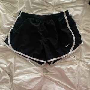 Black Nike running shorts